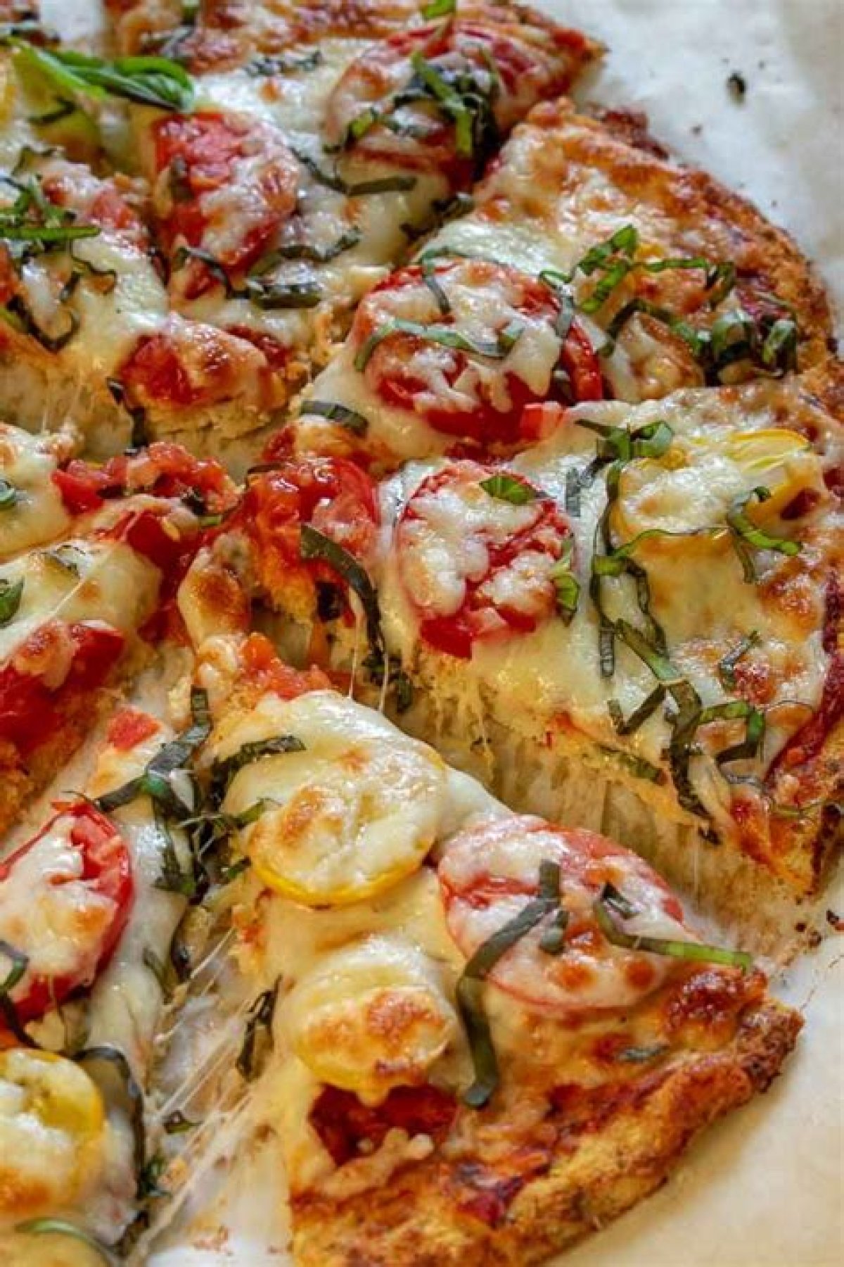 Gluten-Free Cauliflower Crust Pizza with Tomatoes and Salami Will Make You Forget You're Eating Veggies