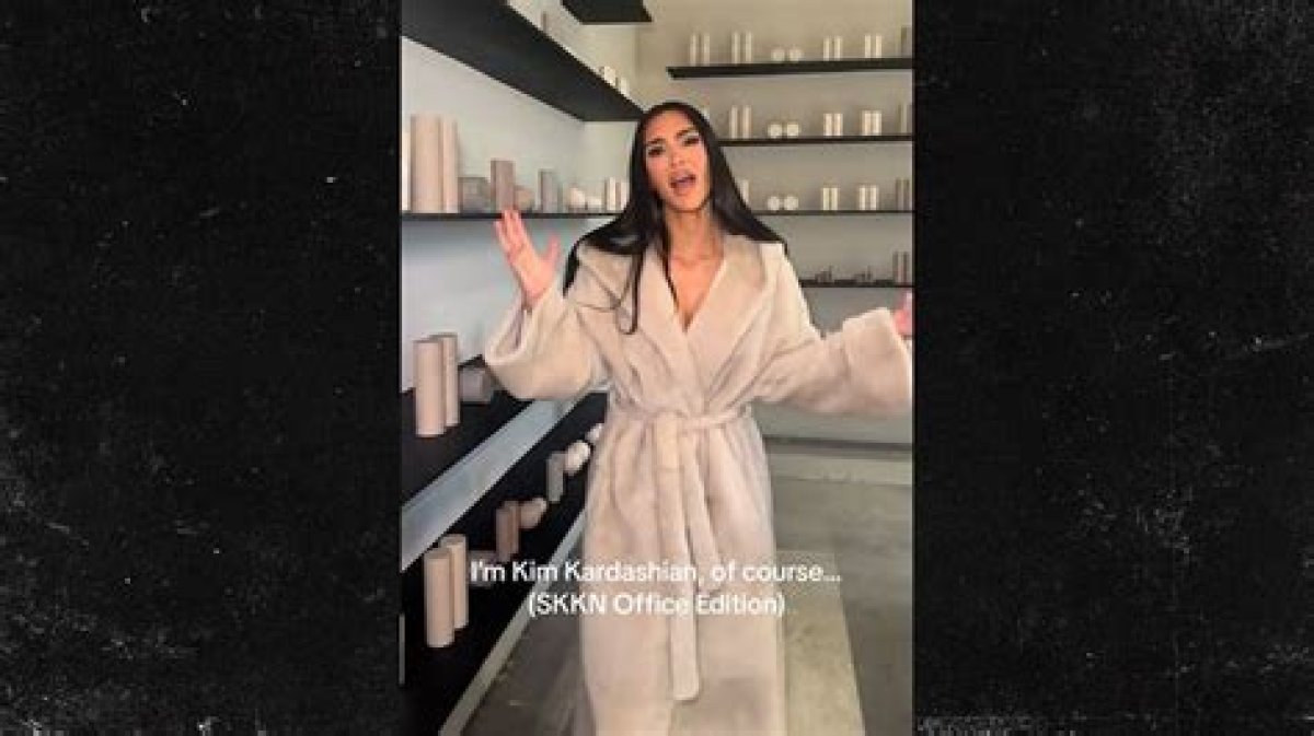 Kim Kardashian Joins Popular 'Of Course' Trend; Reveals Tanning Bed in Office