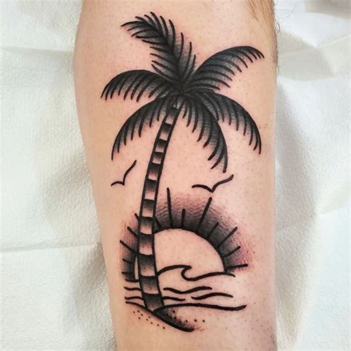 Palm Tree Tattoo: a Symbol of Paradise and Freedom