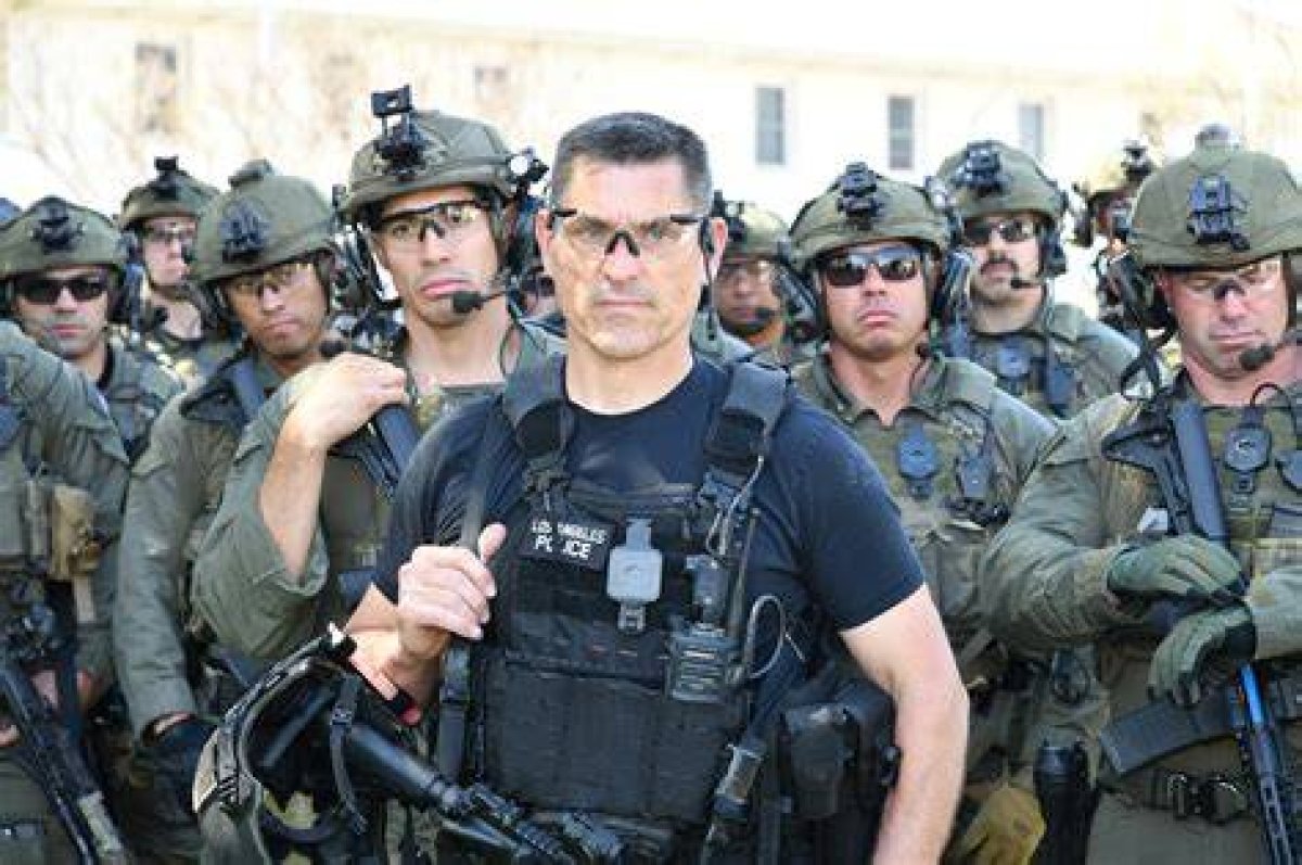 Swat Team Members Who Might Be Stationed on a Roof